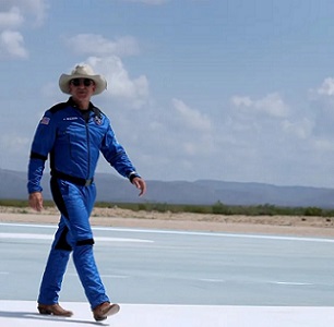 Billionaire Jeff Bezos walks on the tarmac near the Blue Origin rocket that took him to space on July 20. Joe Raedle/Getty Images Billionaire Jeff Bezos walks on the tarmac near the Blue Origin rocket that took him to space on July 20. Joe Raedle/Getty Images