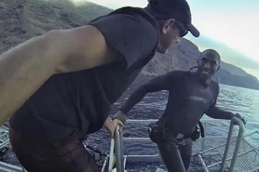 Kobe Bryant and Martin Graf in September of 2013. Bryant had to wear a pair of his Nikes to dive with the sharks.(Courtesy Sharkdiver.com)