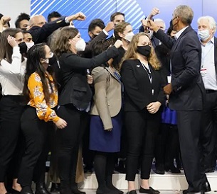 Former US president Barack Obama greets people at COP26 – where negotiators are seeking global progress on climate action. Credit - AP Former US president Barack Obama greets people at COP26 – where negotiators are seeking global progress on climate action. Credit - AP
