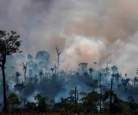 Smokes rises from forest fires in Altamira in August. Farm owners have scuffled with forest defenders in the Amazonian city. Photograph: Joao Laet/AFP/Getty Images