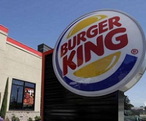 This April 25, 2019, file photo shows a Burger King in Redwood City, Calif. Burger King is announcing its work to help address a core industry challenge: the environmental impact of beef. Credit - AP Photo/Jeff Chiu, File