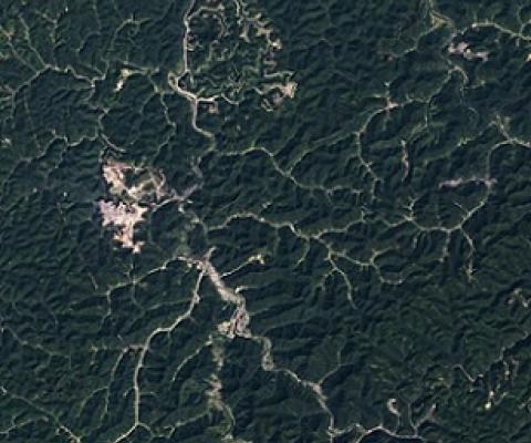 o access the coal contained in the Appalachian Mountains in southern West Virginia, extractive companies engage in a controversial mining method called "mountaintop removal," which Scientists have found that this process negatively impacts groundwater and biodiversity. Credit - NASA Earth Observatory