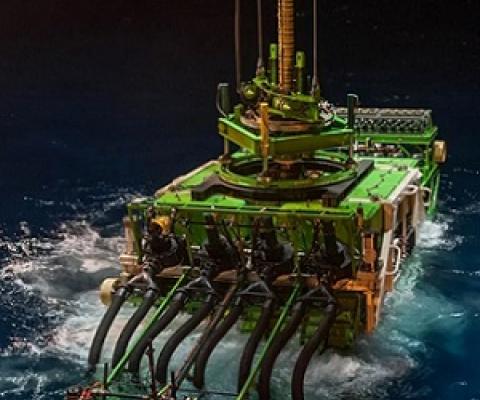 Deep sea mining robot Patania II beginning its descent into the Pacific Ocean. Credit - GSR/Reuters