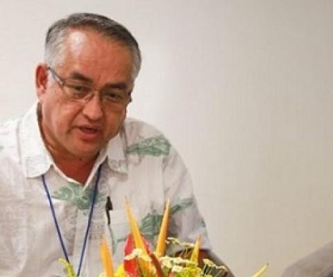 FFC Chair Mr Eugene Pangelinan, left, and FFA Director-General Dr Manu Tupou-Roosen, right, at Sir John Guise Stadium, Port Moresby, for the 16th Tuna Commission meeting. credit - FFA