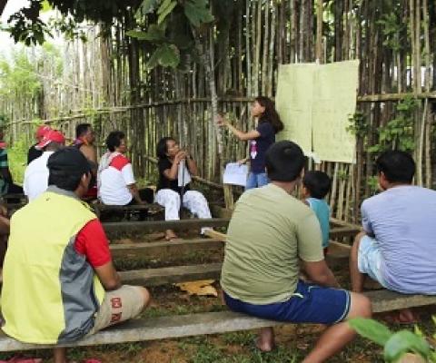 A community meeting in the Pangasananan territory to discuss restoration and farming plans. Courtesy of Virgilio Domogoy/Matricoso