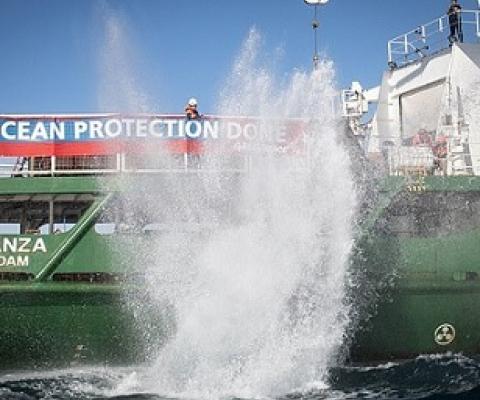 The environmental group says bottom trawling, in which heavy weighted nets are dragged over the seabed to catch fish, is ploughing up the sensitive seabed habitat for which the area is protected. Pictured, boulder dropped from Esperanza on Tuesday. Credit - https://www.dailymail.co.uk/