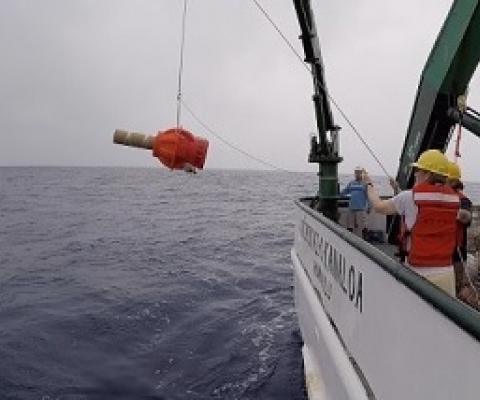 Elizabeth Steffen, a scientist at NOAA’s Pacific Marine Environmental Lab and the University of Hawaii, deploys a Deep Argo float off Hawaii in 2018. The float was tested in preparation for its use in a data-tracking array in the western South Atlantic. NOAA and Vulcan Inc. have been collaborating in the project. (University of Hawaii Photo / Blake Watkins)