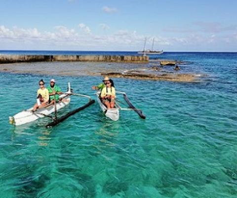 Terena Koteka-Wiki and Konini Rongo arriving in Mitiaro on the paiere, traditional fishing boats. Credit - Te Ipukarea Society