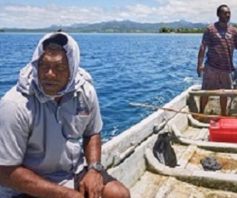  Mosese and Kinikoto collect sea-urchins from the Navakavu Reef, off Fiji’s main island, Viti Levu. The tabu, a traditional marker of fishing grounds, prevents over-fishing. Photograph: Kurt Johnson & Thomas Dallow
