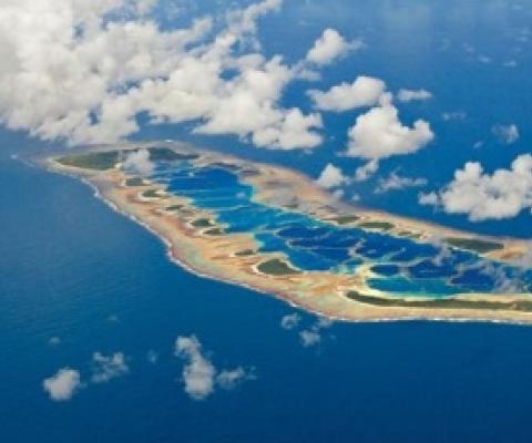 An underwater paradise in the remote Pacific Ocean that includes the sea around Caroline Island, seen here, will be protected—thanks in part to National Geographic’s Pristine Seas project. PHOTOGRAPH BY BRIAN SKERRY